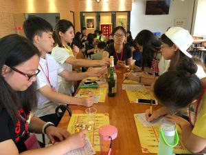 Students filling up the assessment form after tasting each kind of beer. 學員們沉浸在嚐味問卷調查中。